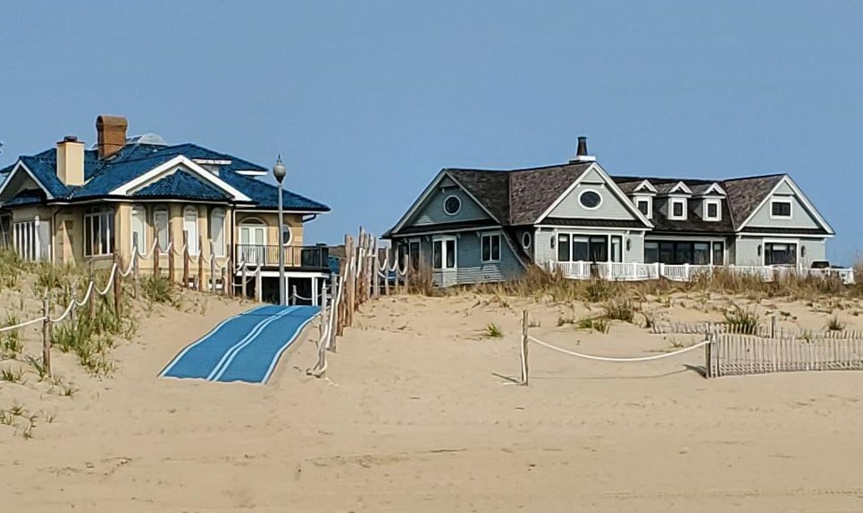 accessibility mat laid out over the sand