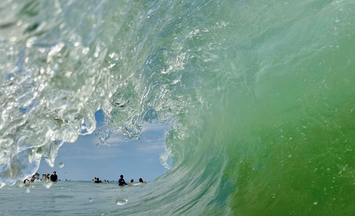 A 2024 Rehoboth Reflections-winning photo of the curl of a wave at Rehoboth Beach